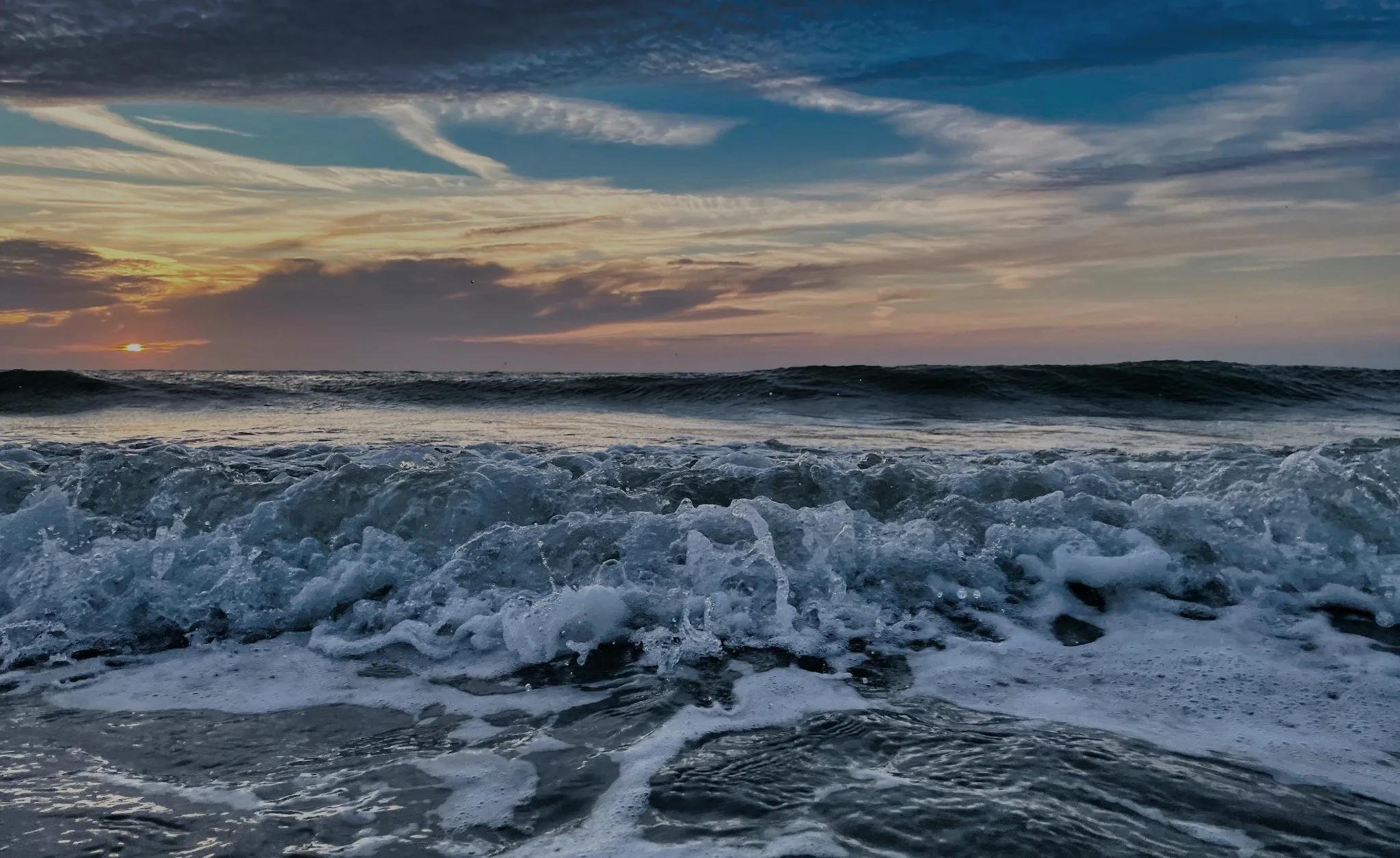 Zeeuwse kust bij zonsondergang