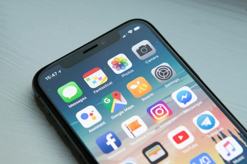 iPhone met apps op het scherm